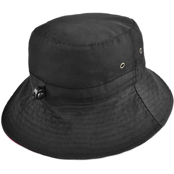 A reversible black bucket hat featuring an adjustable toggle and eyelets for ventilation.