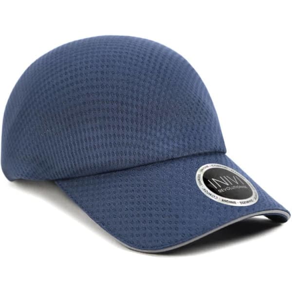 A blue cap made from 100% polyester featuring a logo and a textured surface.
