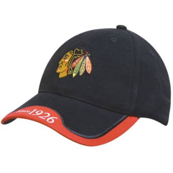 A black cap with a red embroidered trim and logo, featuring a curved peak and a classic design.