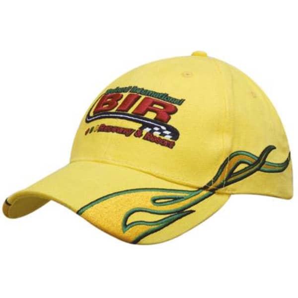 A yellow cap with flame embroidery on the peak and side, featuring a logo and colourful text.