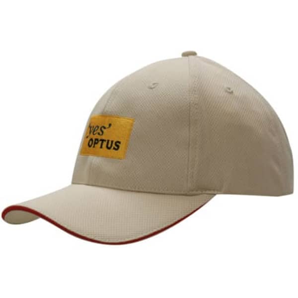A beige cap with a yellow logo patch and red sandwich trim on the brim. The cap has a logo on the front.