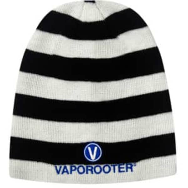 A rolled down acrylic striped beanie in black and white with a logo.