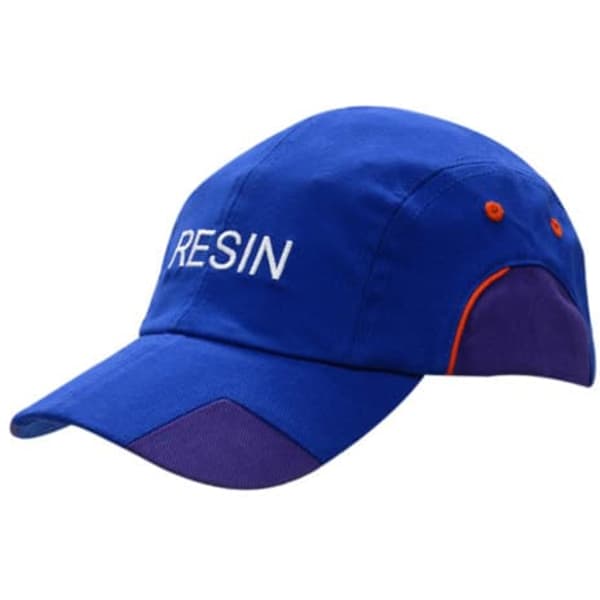 A blue cap with fabric inserts in purple and orange on the crown and peak, featuring a logo.