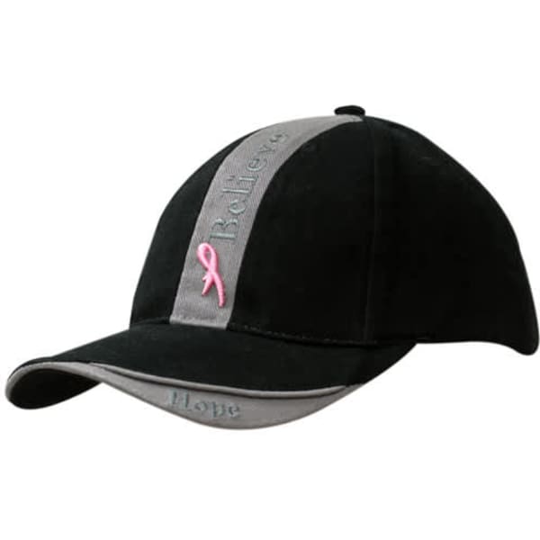 A black and grey cap with a crown insert, peak indent, and logos featuring a pink ribbon.