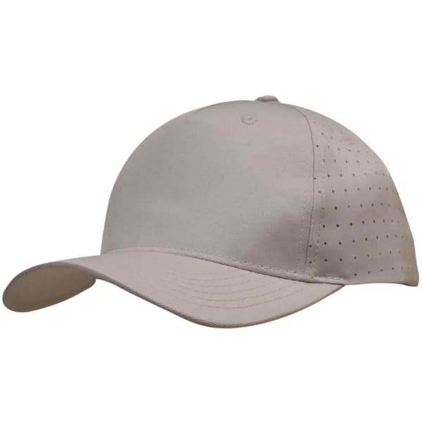 A beige cap with circle perforations on the side and a curved brim, featuring a logo.