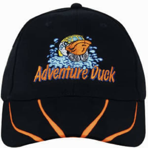 A black cap with a two-tone orange peak, featuring an embroidered design and logo on the front.