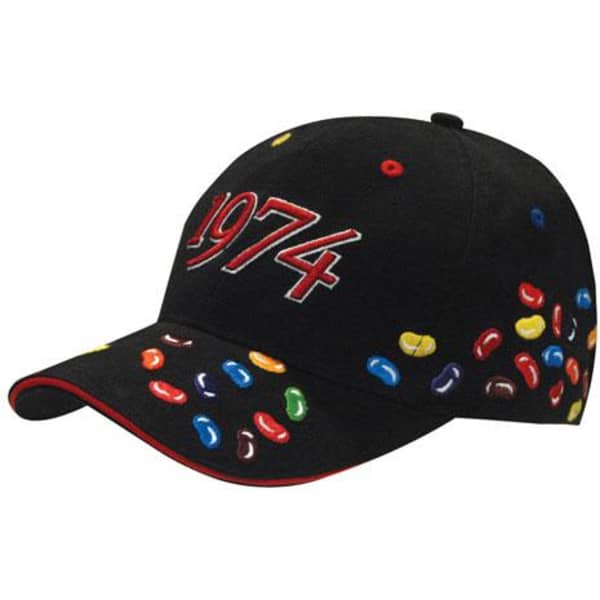 A black cap featuring colourful jelly bean embroidery and the year 