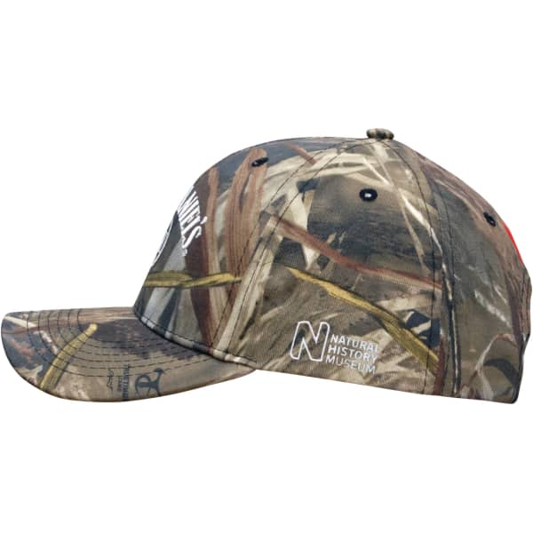 A camouflage 6 panel cap featuring various earthy tones and a logo on the side.