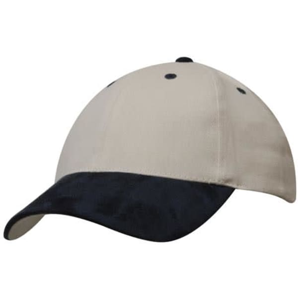 A brushed heavy cotton cap in cream with a navy suede peak and contrasting stitching. Features a logo on the front.