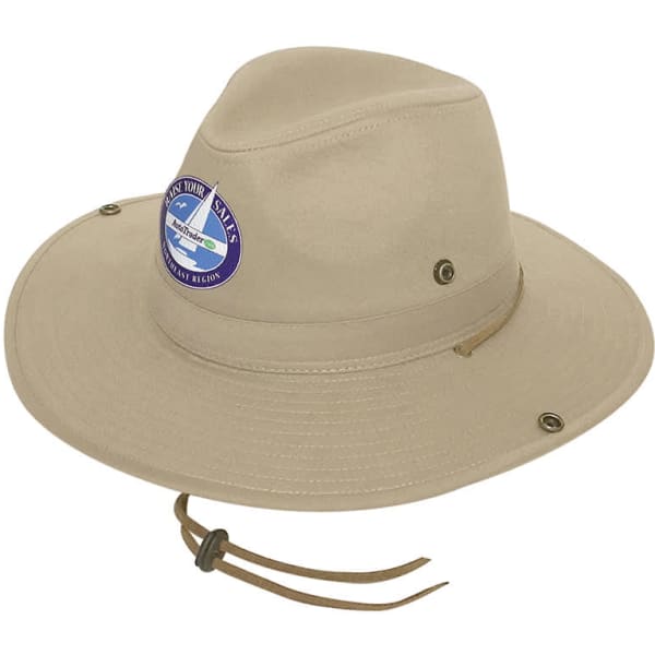 A beige cotton twill hat features a circular logo and a chin strap, designed for outdoor use.