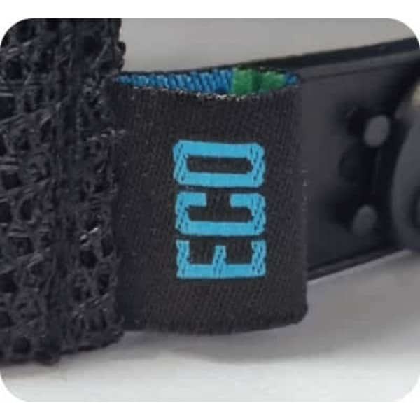 A black cap featuring a breathable mesh back and a tag with "ECO" branding.