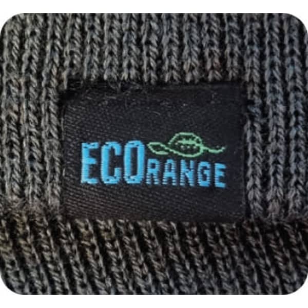 A textured grey beanie featuring a label with branding. The fabric appears to be knitted.