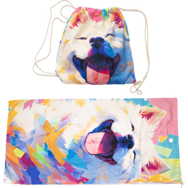 A foldable drawstring towel featuring a vibrant, multicoloured design of a smiling dog, with a matching drawstring bag.