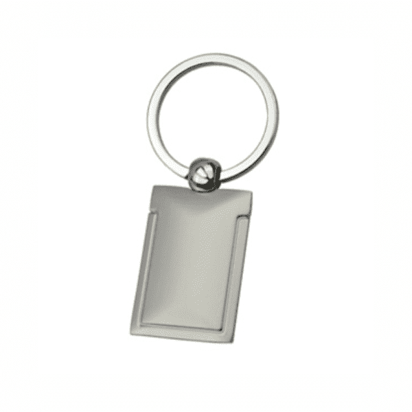 A silver keyring featuring a rectangular pendant attached to a circular ring. The pendant has a sleek, minimalist design.