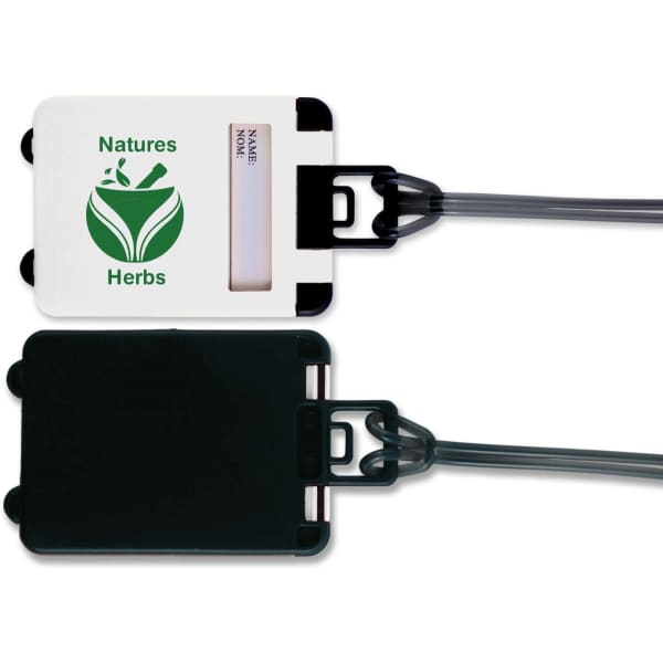 A luggage tag featuring a white front with a green logo and a black back, attached with a transparent strap.