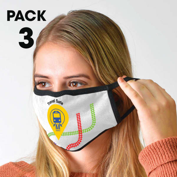 A woman wearing a white face mask with black trim, featuring a travel-themed graphic.