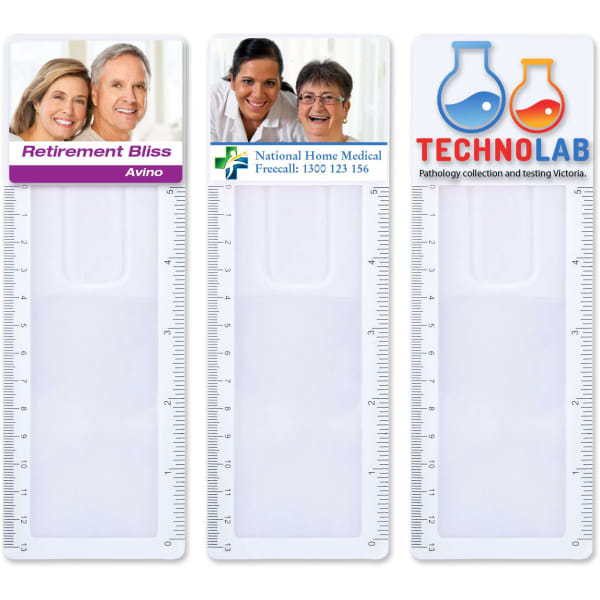 A clear, plastic bookmark magnifier ruler featuring three sections with varying designs and a logo on each section.