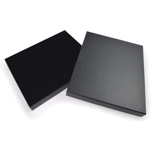 A black gift box with a textured finish, featuring a smooth closure design. Includes a logo on the surface.
