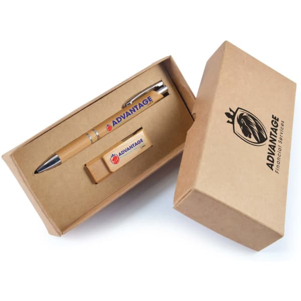 A brown cardboard gift box containing a silver and wooden pen with a logo and a wooden USB drive.