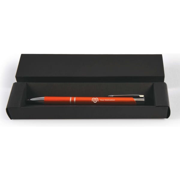 A black cardboard pen box containing a red pen, with a logo visible on the pen.