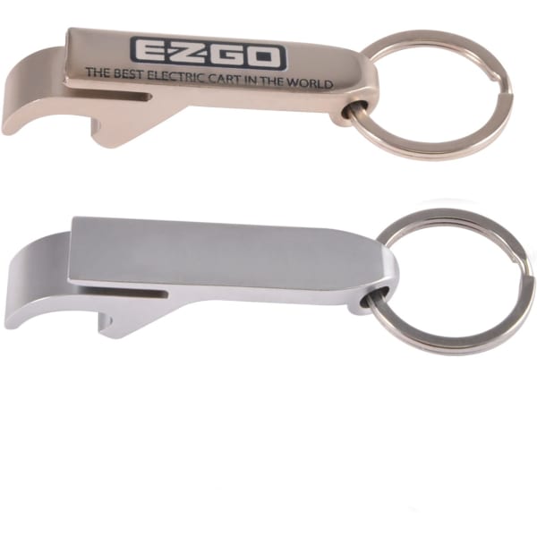 A drink bottle opener keytag in silver and gold, featuring a keyring and a logo.
