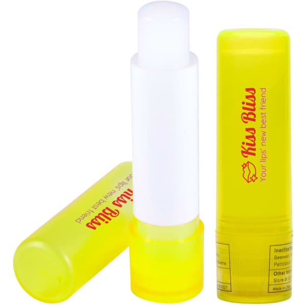 A yellow lip balm stick with a white applicator, featuring a branding logo on the packaging.