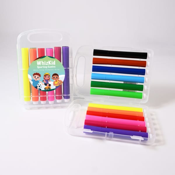 A clear storage case containing vibrant felt tip pens in colours like pink, green, black, and purple, with a logo on the case.