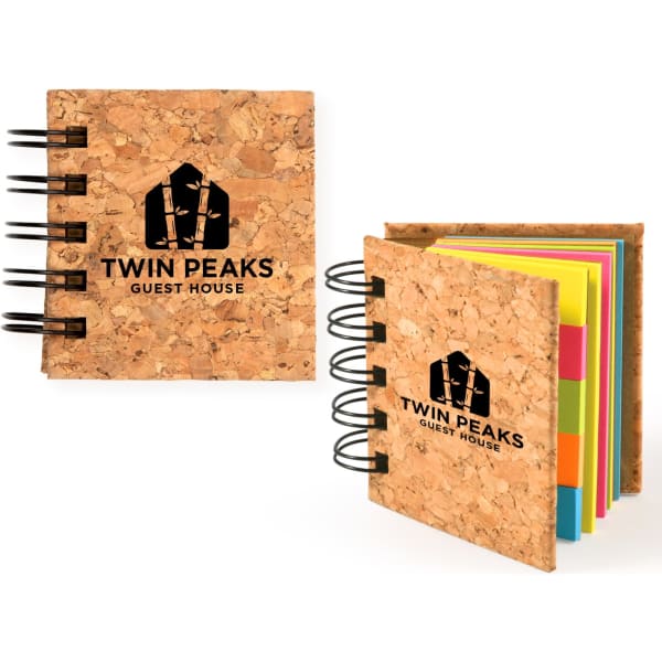 A cork-covered notepad featuring colourful sticky notes in pink, yellow, and green, with a logo on the cover.