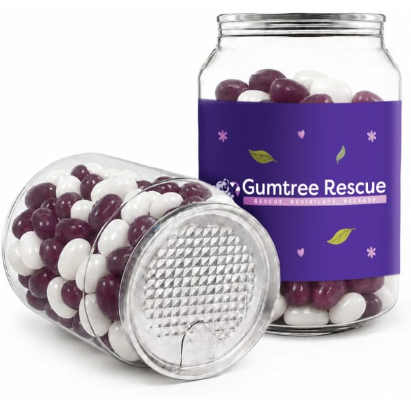 A clear jar filled with purple and white jelly beans, featuring a logo on the front.