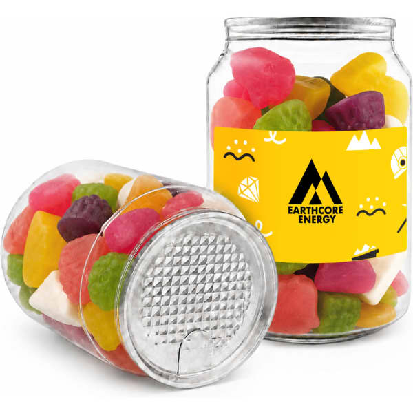 A clear canister containing a colourful assortment of jelly candies, with a logo visible on the packaging.