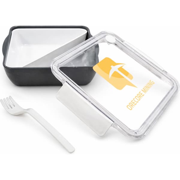 A black and white lunch box with a transparent lid and a fork, featuring a logo on the lid.