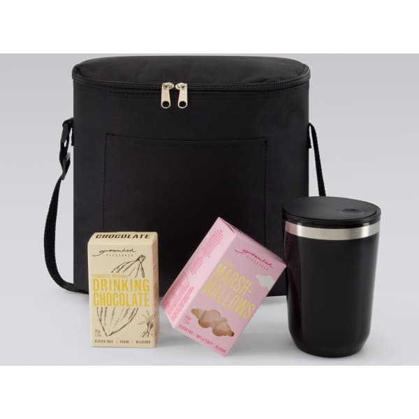 A black insulated bag with a drink container and two boxes of drinking chocolate and marshmallows.