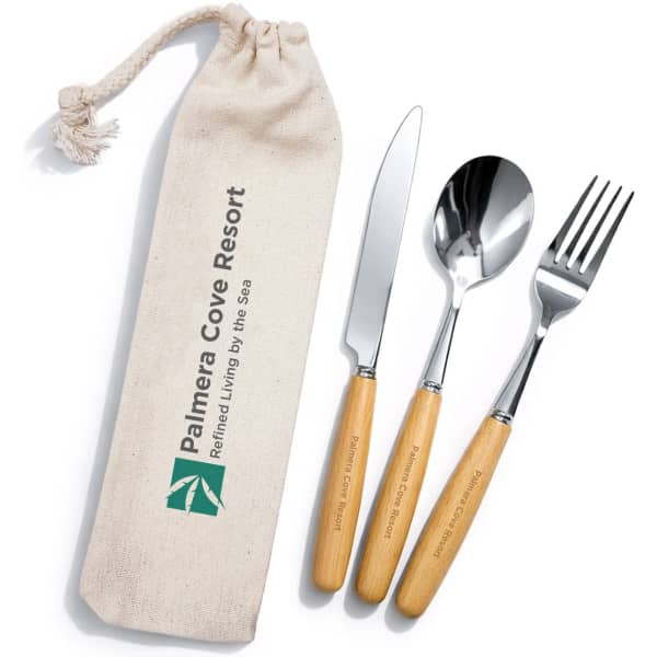 A Savour cutlery set featuring a knife, fork, and spoon with wooden handles in a canvas pouch, branded.