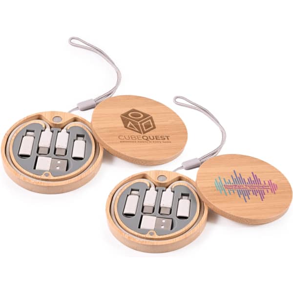 A circular wooden case containing multiple charging cables in grey, featuring a logo and a colourful graphic.