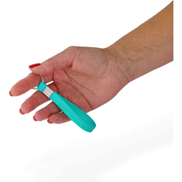 A hand holding a turquoise silicone strap keytag with a silver keyring attachment.