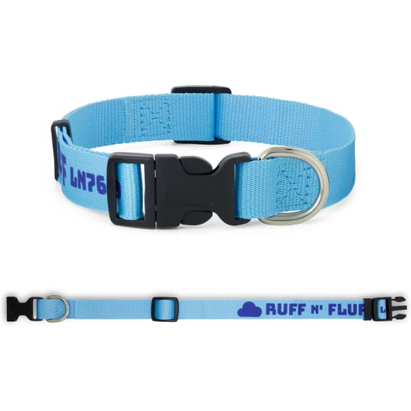 A light blue woven dog collar with a black buckle and a metal D-ring, featuring a logo and adjustable strap.
