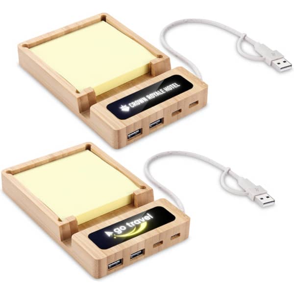 A USB hub with a bamboo design, featuring sticky note space and multiple USB ports, connected by a cable.