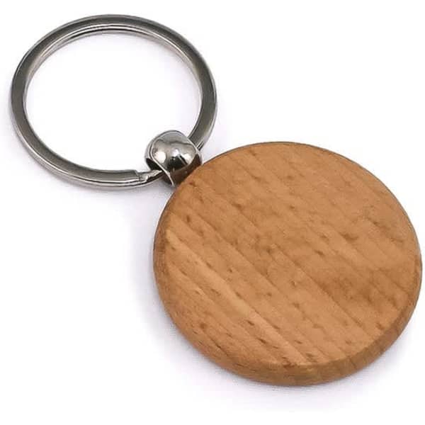 A round wooden keyring with a metallic silver attachment. The wood has a natural light finish.