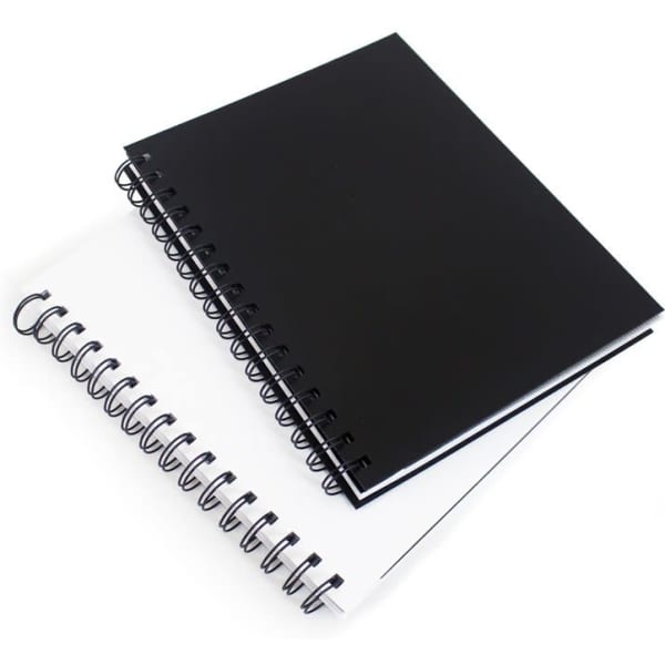 A5 spiral bound notebook with a black cover and coil binding, featuring both plain and lined pages.