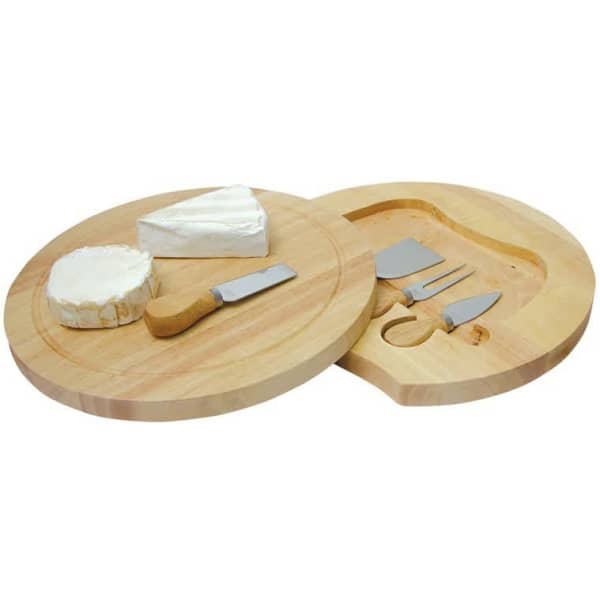 A wooden cheese board with a swivel design, featuring two cheese varieties and three serving utensils.