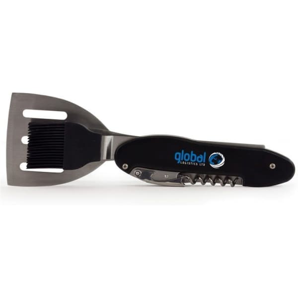 A multi-function BBQ tool in black, featuring a spatula, brush, and knife. The tool includes a logo.