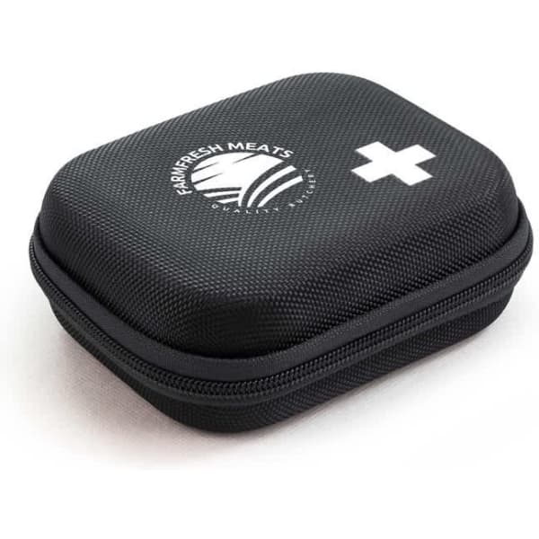A compact black first aid kit with a cross symbol and a logo, featuring a zippered enclosure.