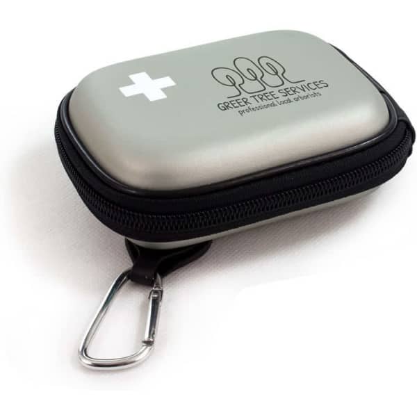 A silver first aid kit with a black zipper and carabiner, featuring a medical cross and a logo.