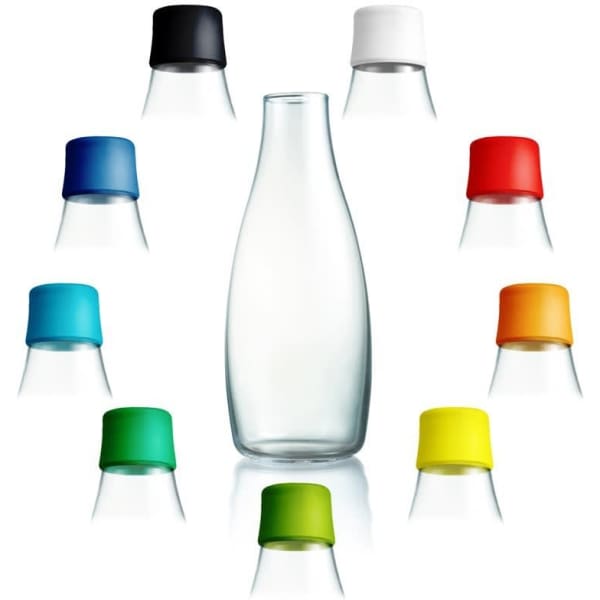 A drink bottle with a clear glass body and various coloured caps, including black, white, red, and yellow.