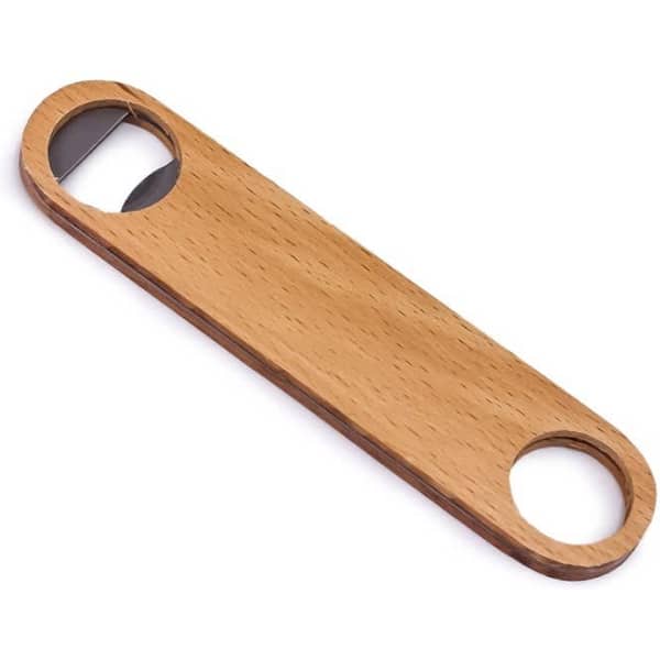 A drink bottle opener made of light wood, featuring two circular openings at each end for easy grip.
