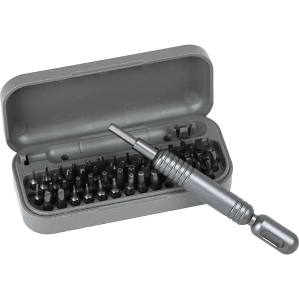 A grey pocket screwdriver tool set with a variety of bits inside a compact case. Includes a screwdriver handle.