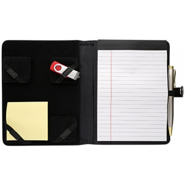 A5 compendium featuring black fabric, with pockets for a USB drive and a pen, and includes lined notepad and sticky notes.