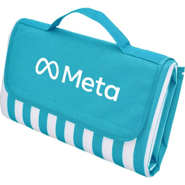 A picnic rug in aqua blue with white stripes, featuring a logo on the front and a carry handle.