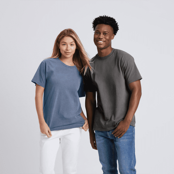 Two models standing side by side, wearing Comfort Colors Adult Heavyweight T-Shirts in blue and charcoal grey.