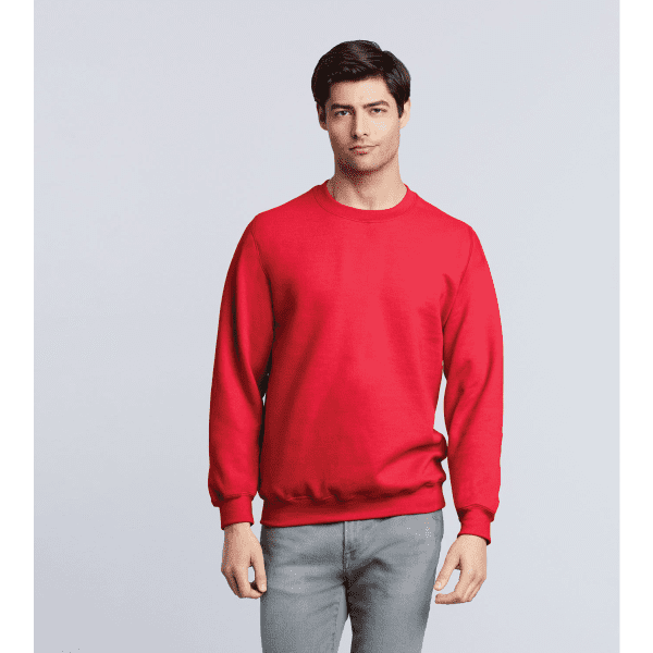 A red crewneck sweatshirt worn by a model, featuring long sleeves and a relaxed fit. It has a small logo.
